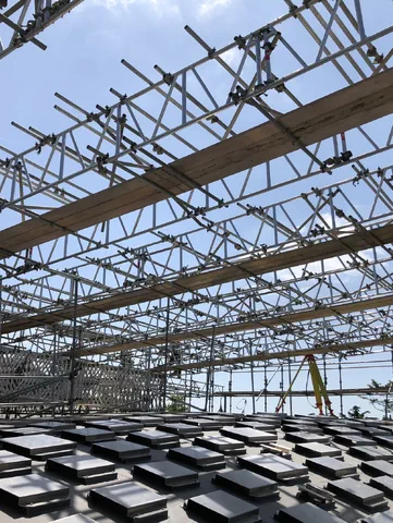 Brogan striking Temporary roof at Oxford University Quad